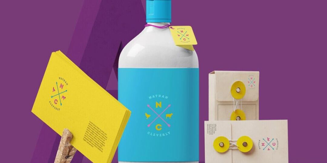 Colorful packaging design featuring bottle and cards.